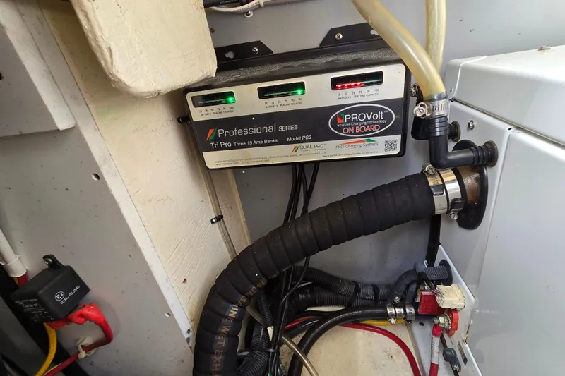 Slide: The Image of Battery charger system in a 2015 Monterey 315 Sport Yacht engine compartment. - 27