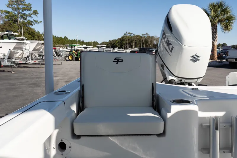 Slide: The Image of 2026 Sea Pro 230 Bay boat with Suzuki outboard motor in a marina setting. - 9