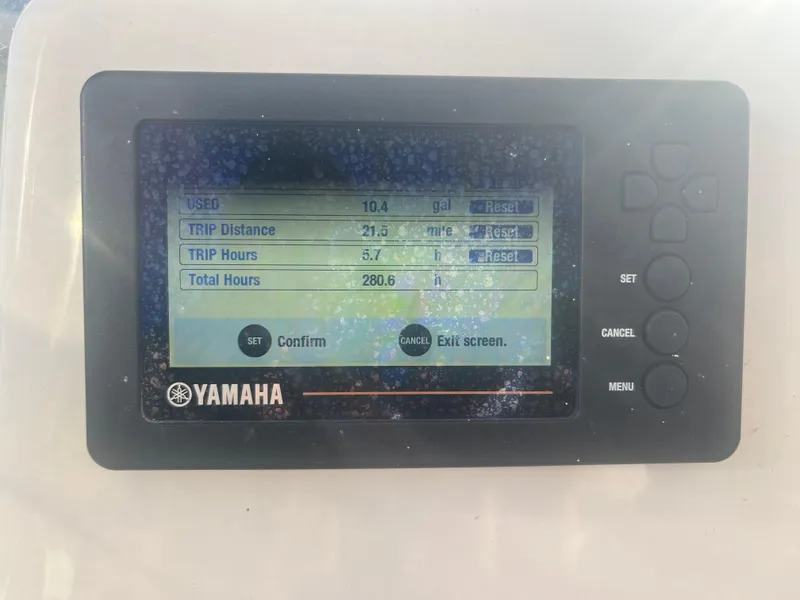 Slide: The Image of Yamaha display showing trip data on a 2019 Cobia 237 Center Console boat. - 27