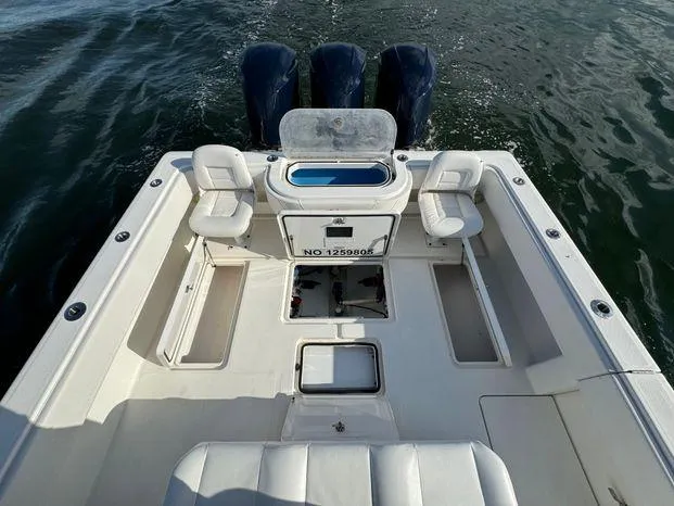 Slide: The Image of 2015 Invincible 39 Open Fisherman boat with spacious deck and triple engines. - 22