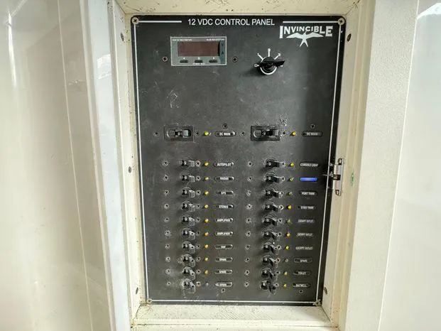 Slide: The Image of 12 VDC control panel on 2015 Invincible 39 Open Fisherman boat. - 42