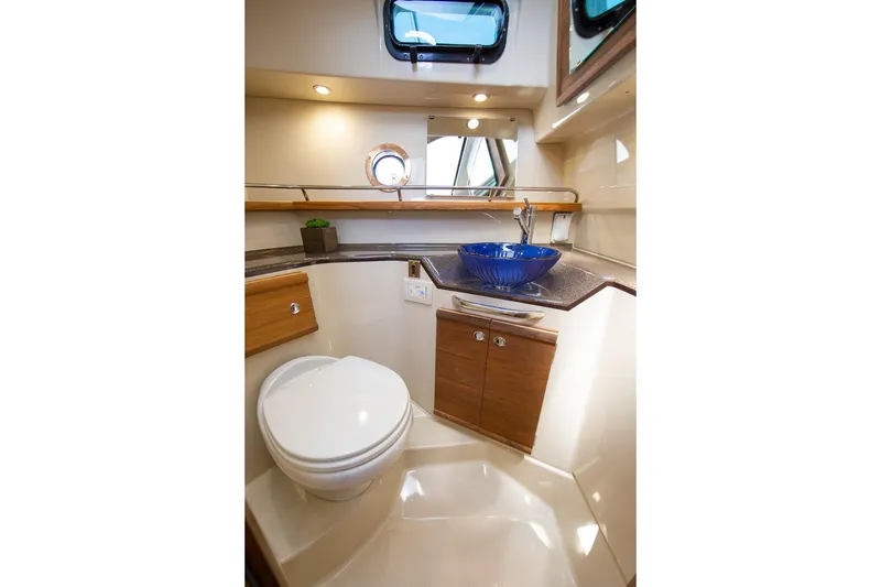Slide: The Image of Luxurious 2026 Ranger Tugs R-29S bathroom with modern fixtures and elegant design. - 13