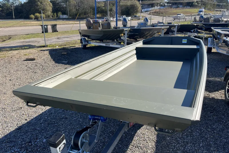 Slide: The Image of 2026 Alweld 1648 Marsh Jon boat on trailer in outdoor lot. - 5