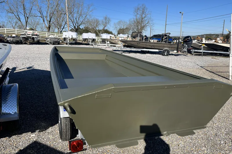 Slide: The Image of 2026 Alweld 1648 Marsh Jon boat on trailer in outdoor lot. - 8