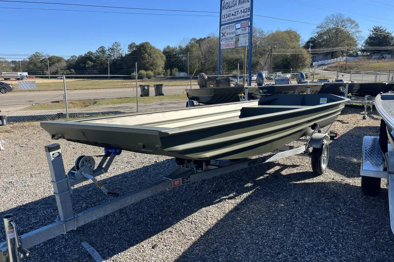 Slide: The Image of 2026 Alweld 1648 Marsh Jon boat on trailer in outdoor dealership lot. - 6