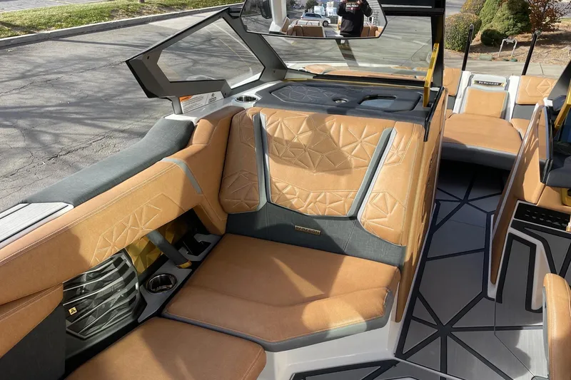 Slide: The Image of 2024 Nautique Super Air Nautique G23 Paragon interior with luxurious seating and modern design. - 10