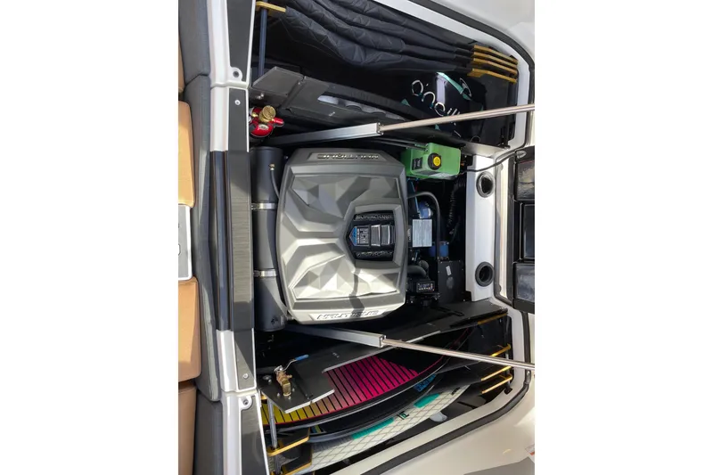 Slide: The Image of 2024 Nautique Super Air Nautique G23 Paragon engine compartment, showcasing advanced design and components. - 13