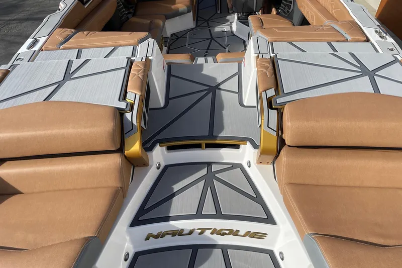 Slide: The Image of 2024 Nautique Super Air Nautique G23 Paragon interior with luxurious seating and modern design. - 4