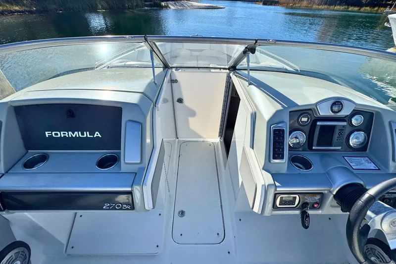 Slide: The Image of 2012 Formula 270 Bowrider dashboard and cockpit view on a sunny day. - 8