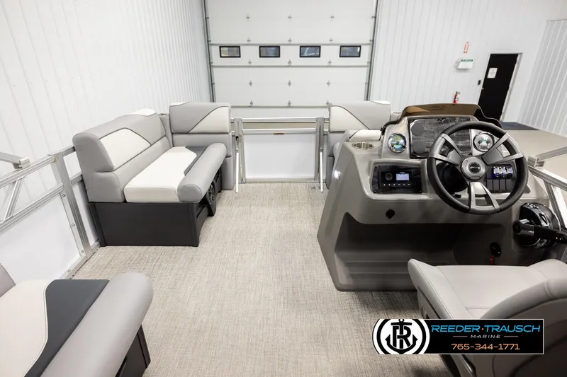Slide: The Image of Interior of 2026 Avalon VEN CR boat with modern seating and steering console. - 17