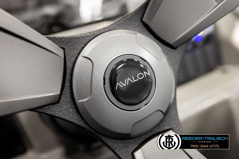Slide: The Image of Steering wheel of 2026 Avalon VEN CR boat, featuring sleek design and branding. - 24