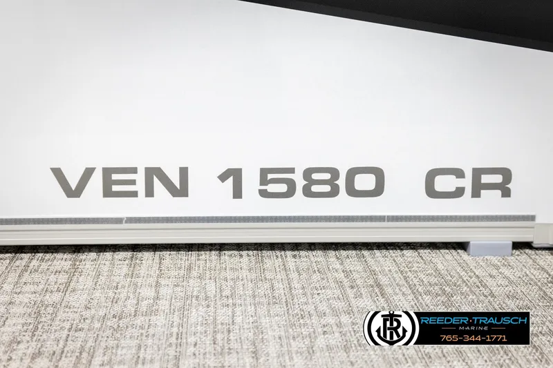 Slide: The Image of 2026 Avalon VEN CR boat model with "VEN 1580 CR" text and Reeder-Trausch Marine logo. - 40