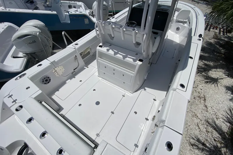 Slide: The Image of 2026 Sportsman Open 322 Center Console boat interior with spacious deck and modern features. - 2