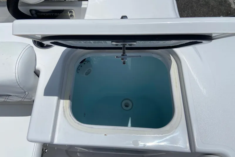 Slide: The Image of Livewell on 2026 Sportsman Open 322 Center Console boat, open lid view. - 6