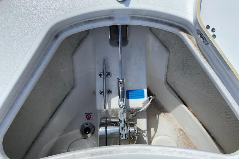 Slide: The Image of Anchor compartment of 2026 Sportsman Open 322 Center Console boat. - 32