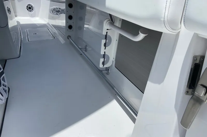 Slide: The Image of 2026 Sportsman Open 322 Center Console interior, featuring sleek white design and modern fixtures. - 16