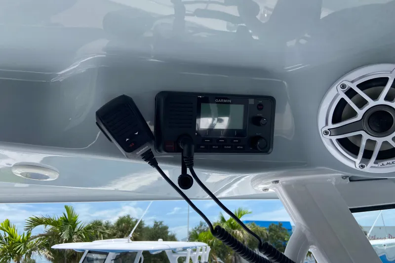 Slide: The Image of 2026 Sportsman Open 322 Center Console with Garmin radio and JL Audio speaker system. - 23