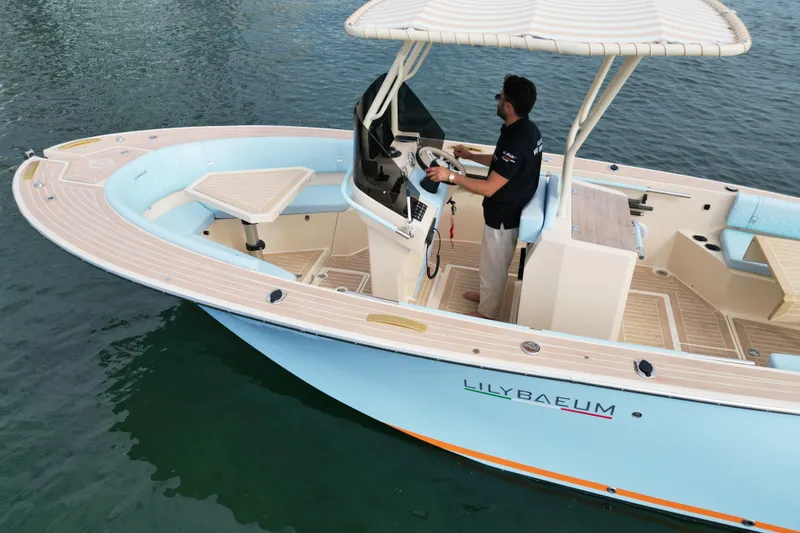 Slide: The Image of 2026 Lilybaeum Levanzo 25 Lounge Deck boat on water, featuring modern design and spacious deck. - 12