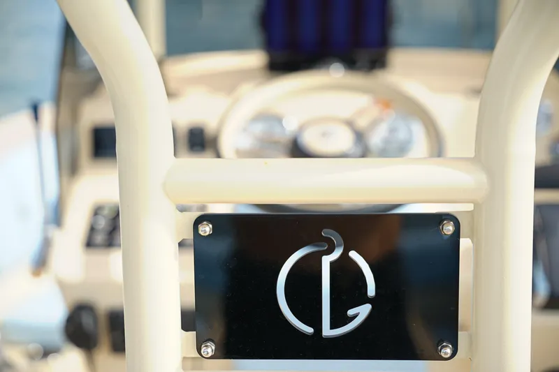 Slide: The Image of 2026 Lilybaeum Levanzo 25 Lounge Deck boat interior with logo detail. - 17