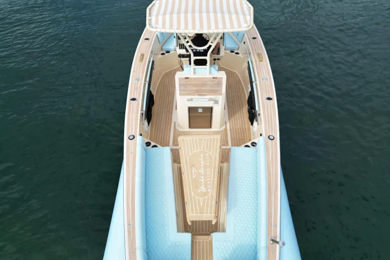 Slide: The Image of Lilybaeum Levanzo 25 Lounge Deck 2026, top view, elegant design on water. - 24