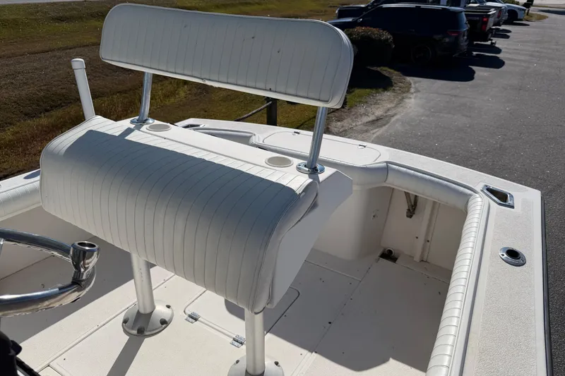 Slide: The Image of Battery compartment of a 2006 Shamrock 220 Stalker boat, showing two secured batteries. - 15