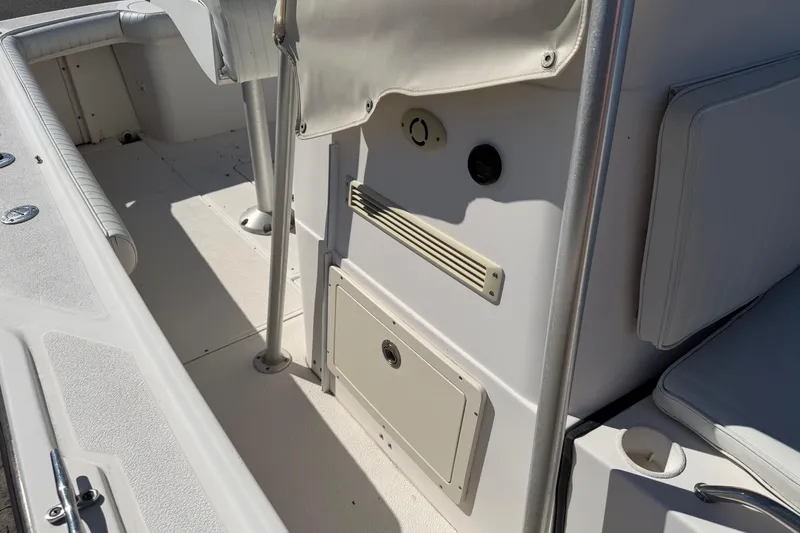 Slide: The Image of 2006 Shamrock 220 Stalker boat console with Garmin navigation and steering wheel. - 22