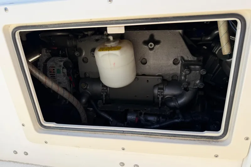 Slide: The Image of 2006 Shamrock 220 Stalker boat interior with organized storage compartments. - 28