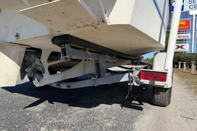 Slide: The Image of 2006 Shamrock 220 Stalker boat on trailer, close-up of hull and support. - 34