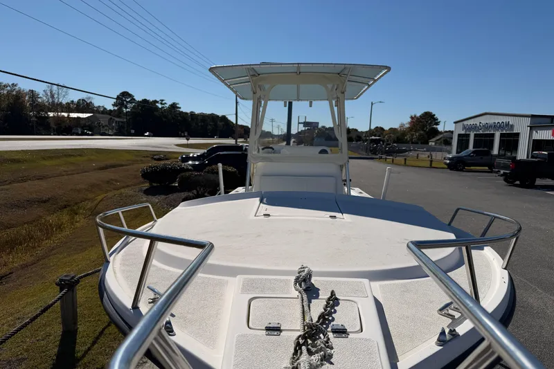 Slide: The Image of 2006 Shamrock 220 Stalker boat on display at outdoor showroom. - 9