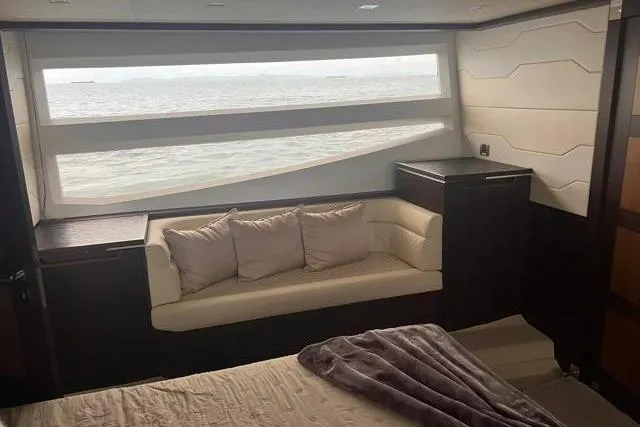 Slide: The Image of Luxurious interior of 2016 Galeon 660 Flybridge yacht with ocean view window. - 13