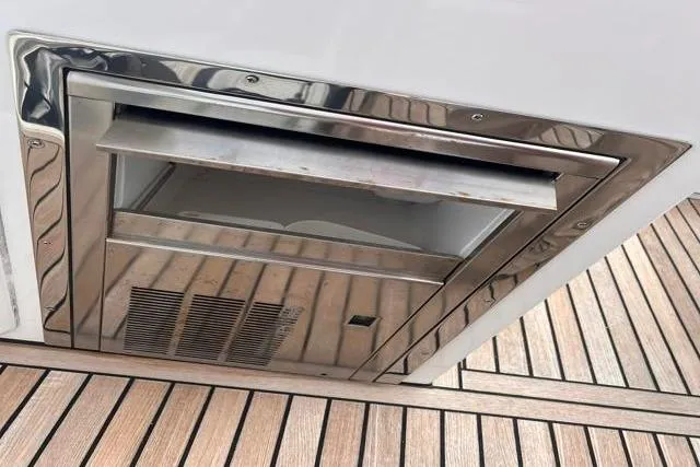 Slide: The Image of Built-in stainless steel appliance on Galeon 660 Flybridge yacht, 2016 model, with wooden deck. - 21