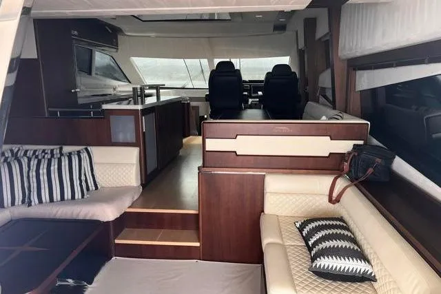 Slide: The Image of Luxurious interior of 2016 Galeon 660 Flybridge yacht with elegant seating and modern design. - 27