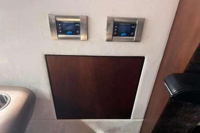 Slide: The Image of Control panel on 2016 Galeon 660 Flybridge yacht interior wall. - 32