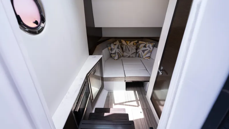 Slide: The Image of Interior cabin of 2020 Cruisers Yachts 38 GLS OB with cozy seating and modern design. - 36