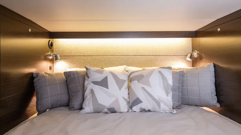 Slide: The Image of Cozy cabin bed with decorative pillows in 2020 Cruisers Yachts 38 GLS OB. - 44