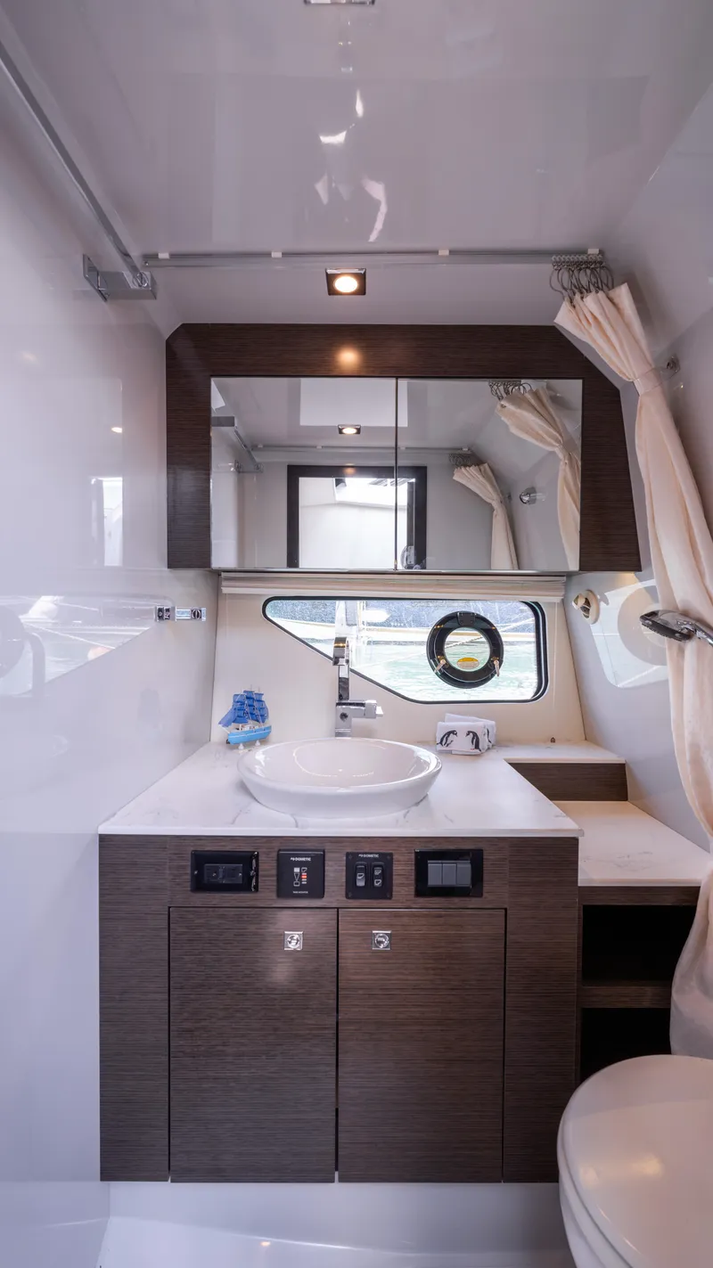 Slide: The Image of Modern bathroom interior of 2020 Cruisers Yachts 38 GLS OB, featuring sleek design and fixtures. - 46