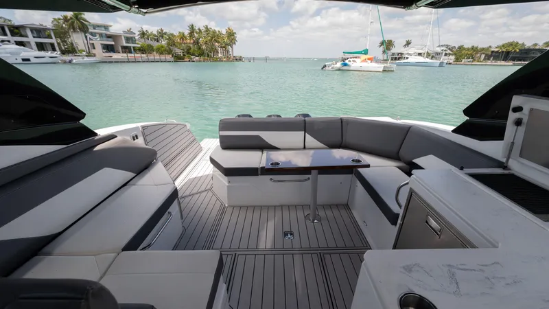 Slide: The Image of Luxurious 2020 Cruisers Yachts 38 GLS OB interior with waterfront view. - 20
