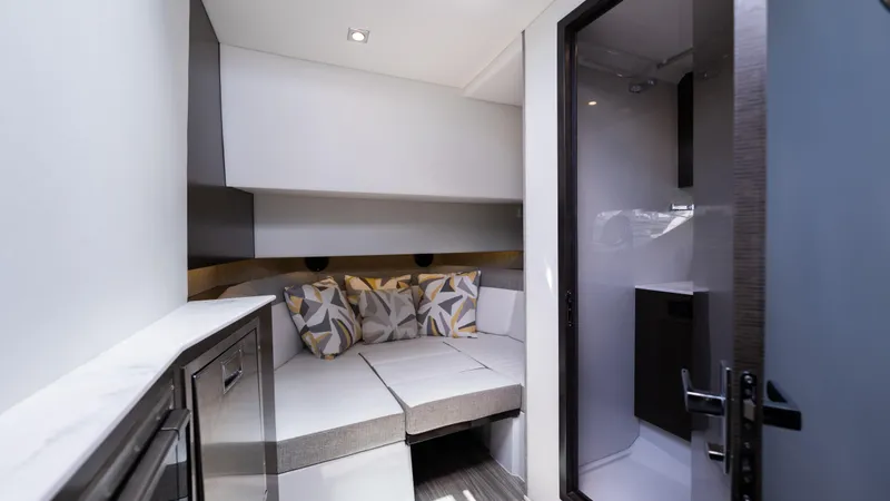 Slide: The Image of Interior cabin of 2020 Cruisers Yachts 38 GLS OB, featuring cozy seating and modern design. - 37