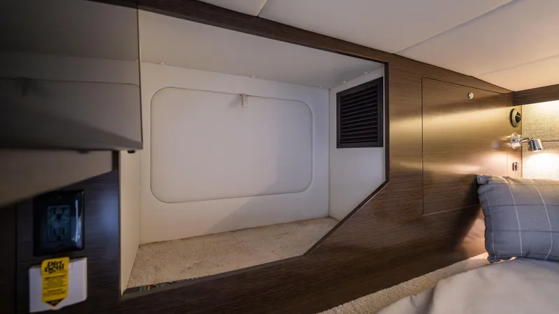 Slide: The Image of Interior cabin of 2020 Cruisers Yachts 38 GLS OB, featuring modern design and cozy bedding. - 45