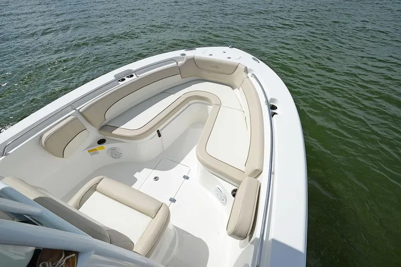 Slide: The Image of Manufacturer Provided Image: 2018 NauticStar 2602 Legacy boat with spacious seating on the water. - 15