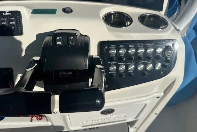 Slide: The Image of Control panel of 2018 NauticStar 2602 Legacy boat with Yamaha throttle and switches. - 24