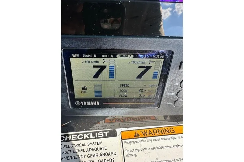 Slide: The Image of Yamaha boat display showing RPM and fuel levels on a 2018 NauticStar 2602 Legacy. - 37