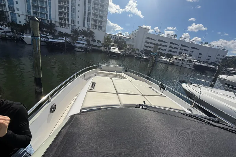 Slide: The Image of 2023 Azimut Verve 47 yacht logo with marina reflection. - 13