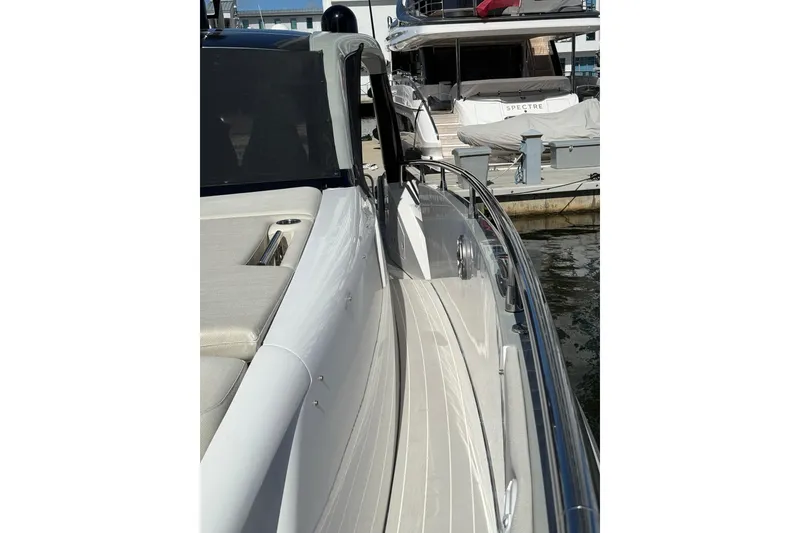 Slide: The Image of 2023 Azimut Verve 47 yacht interior with sleek seating and modern design. - 17