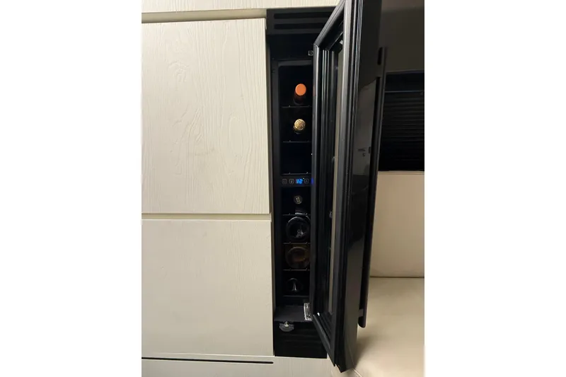 Slide: The Image of Seakeeper and Sea-Fire controls on 2023 Azimut Verve 47 yacht dashboard. - 45