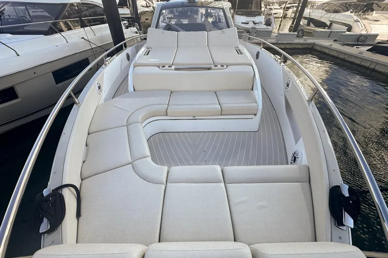 Slide: The Image of 2023 Azimut Verve 47 yacht with spacious deck and luxurious seating. - 51