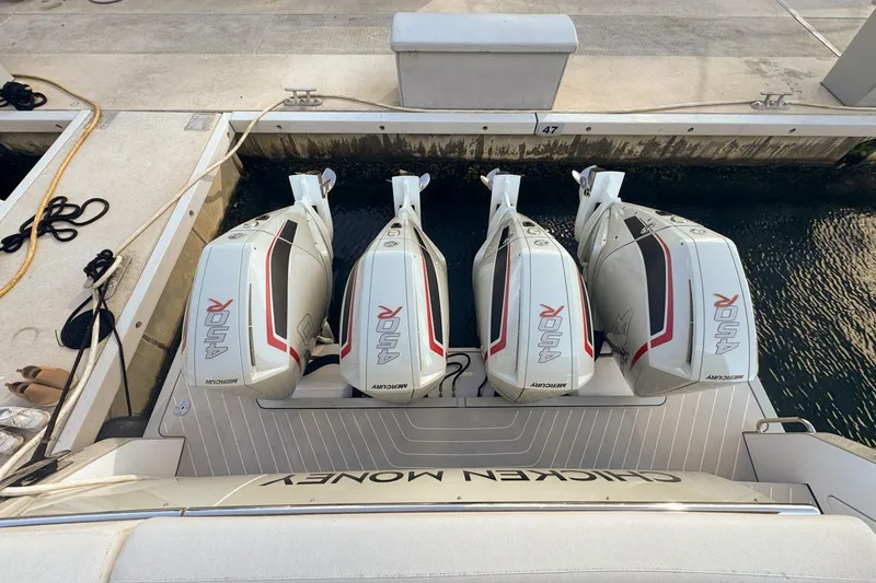 Slide: The Image of 2023 Azimut Verve 47 with four powerful Mercury 450R outboard engines at dock. - 64