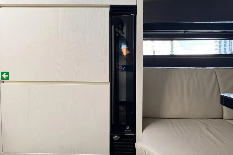 Slide: The Image of Interior of 2023 Azimut Verve 47 yacht with sleek cabinetry and seating. - 71