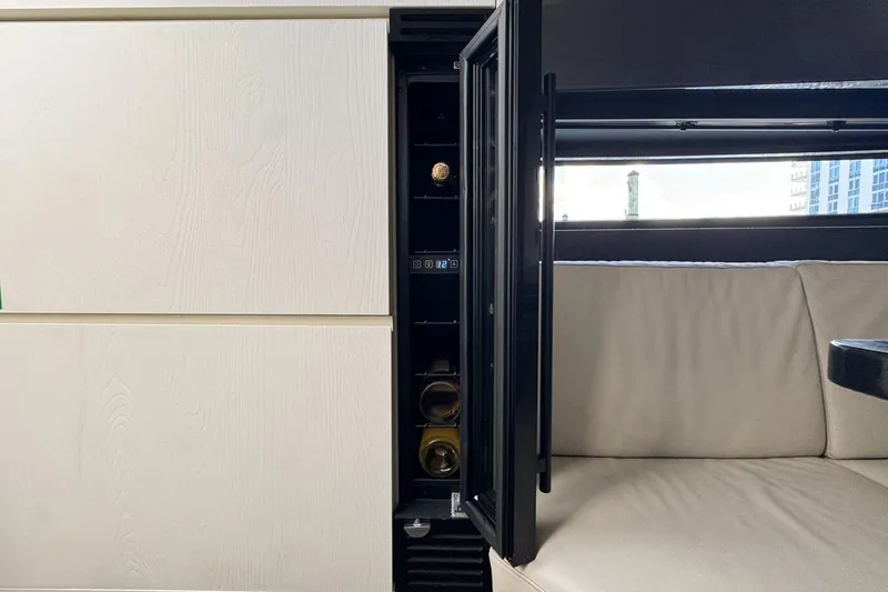 Slide: The Image of Luxurious interior of 2023 Azimut Verve 47 yacht with sleek cabinetry and seating. - 72