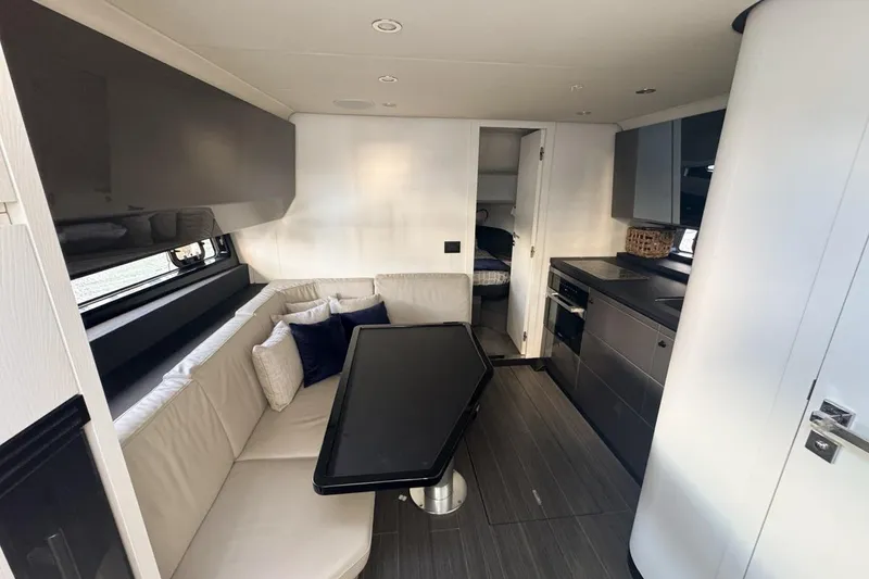 Slide: The Image of Luxurious interior of 2023 Azimut Verve 47 yacht with modern kitchen and seating area. - 74